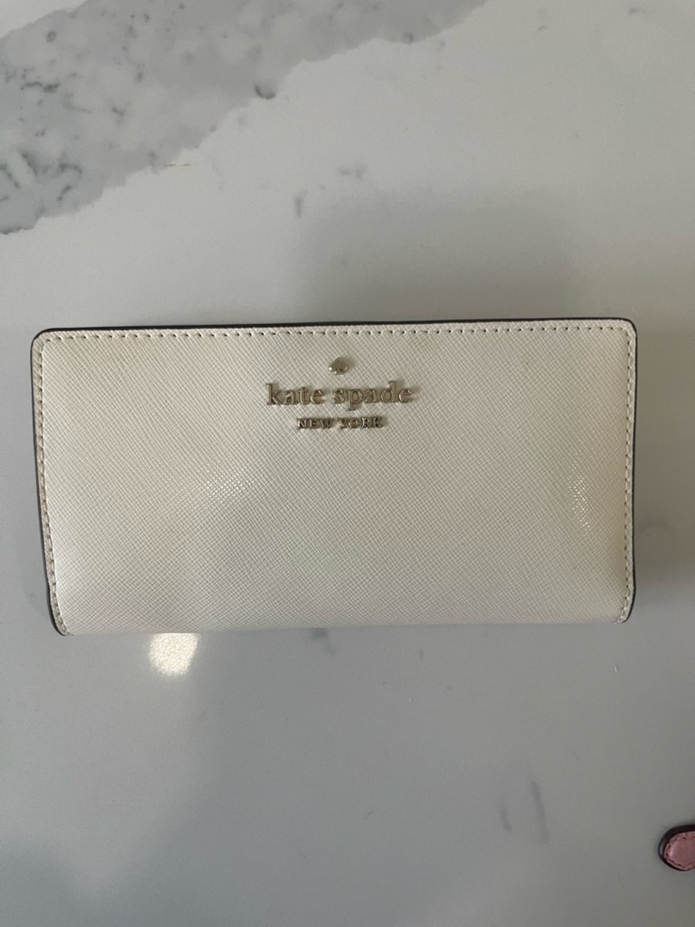 kate spade off white zip wallet with heart-print interior